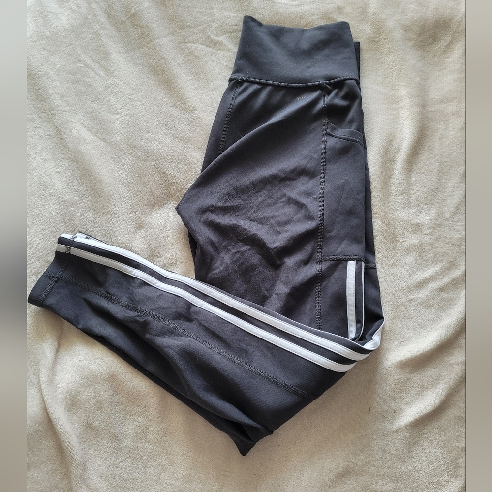 Black Adidas leggings size M, With pockets on the sides.